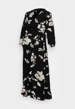 Schwarzes Wickelkleid mit weißen Blumenmustern, langen Ärmeln, einem Rüschensaum und einer Bindung an der Taille. Hergestellt aus leichtem Stoff.