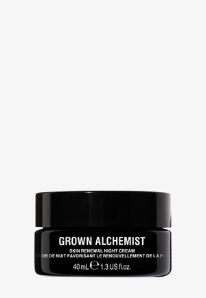 Vaso di vetro nero della crema notte per il rinnovamento della pelle GROWN ALCHEMIST, 40 mL. Testo bianco sul davanti. Superficie liscia, forma rotonda, design minimalista.