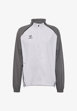 Witte en grijze sportjas met volledige ritssluiting, lange mouwen, elastische manchetten en een "hummel" logo op de linkerborst.