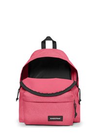 Pink glitter backpack with a black interior. Features a rounded top, adjustable straps, and a front pocket with a flap closure.