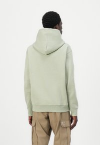 New Balance ALL DAY UNIFORM HOODIE UNISEX - Mikina - green