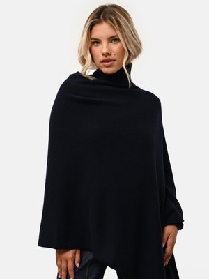 Poncho de marina hecho de material suave, con un diseño relajado que presenta un cuello alto y un corte holgado. Una forma simple y elegante sin adornos.