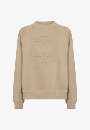 Beżowa bluza z okrągłym dekoltem i raglanowymi rękawami, z teksturowanym logo na środku oraz ściągaczami przy rękawach i u dołu. Miękka tekstura materiału.