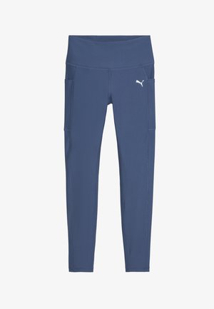 Blue athletic leggings in a smooth fabric, featuring a high waistband and two side pockets. Decorated with a small white logo.