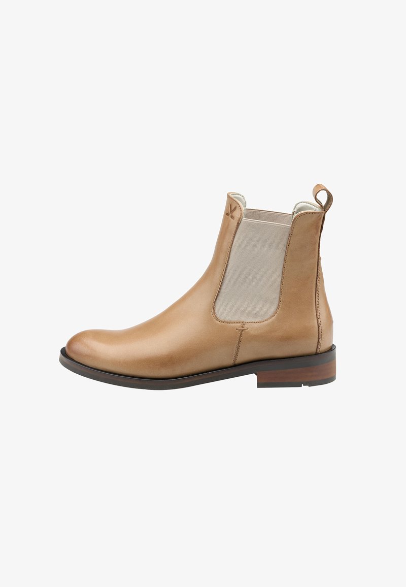 Tan leather Chelsea boot with elastic side panels, rounded toe, pull tab, and a low stacked heel. Smooth texture and minimalist design.