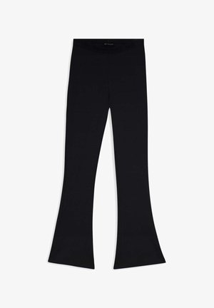 Leggings neri a zampa d'elefante con una vita alta, realizzati in tessuto elastico, caratterizzati da una texture liscia e da una silhouette aderente.