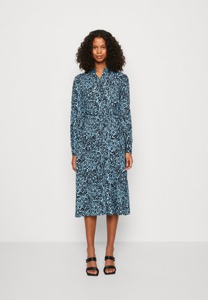 Blue and black patterned dress with a collar, long sleeves, and a cinched waist, extending to mid-calf length. Smooth fabric texture.