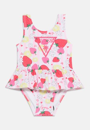 Damski strój kąpielowy bez rękawów z różowo-białymi paskami, nadrukiem truskawek i cytryn, falbanioną spódniczką oraz logo Guess z motywem palmy.