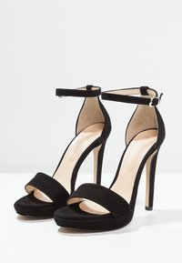 MAI PIÙ SENZA Sandály na vysokém podpatku - black