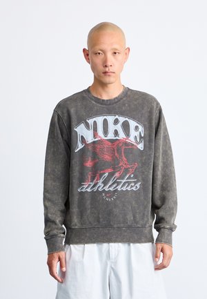 Grijze katoen sweatshirt met een groot Nike-logo in wit en rood en een paardenafbeelding. Ontworpen met een ronde hals en lange mouwen.