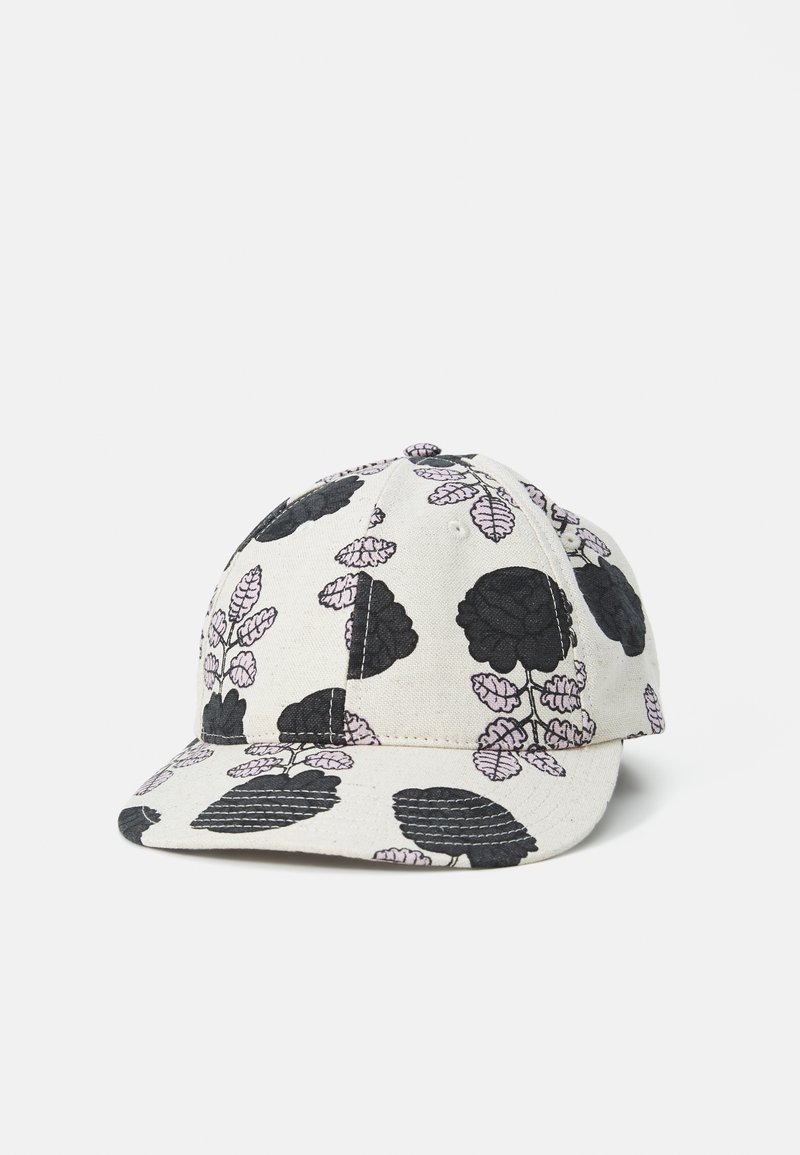 Cap with a black floral pattern on a light beige background, featuring a curved brim and textured fabric. Stitching accents enhance the design.
