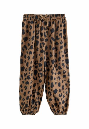 Brune joggerbukser med leopardprint i sort pletter. Har en elastisk talje med snor og elastiske manchetter ved anklerne.