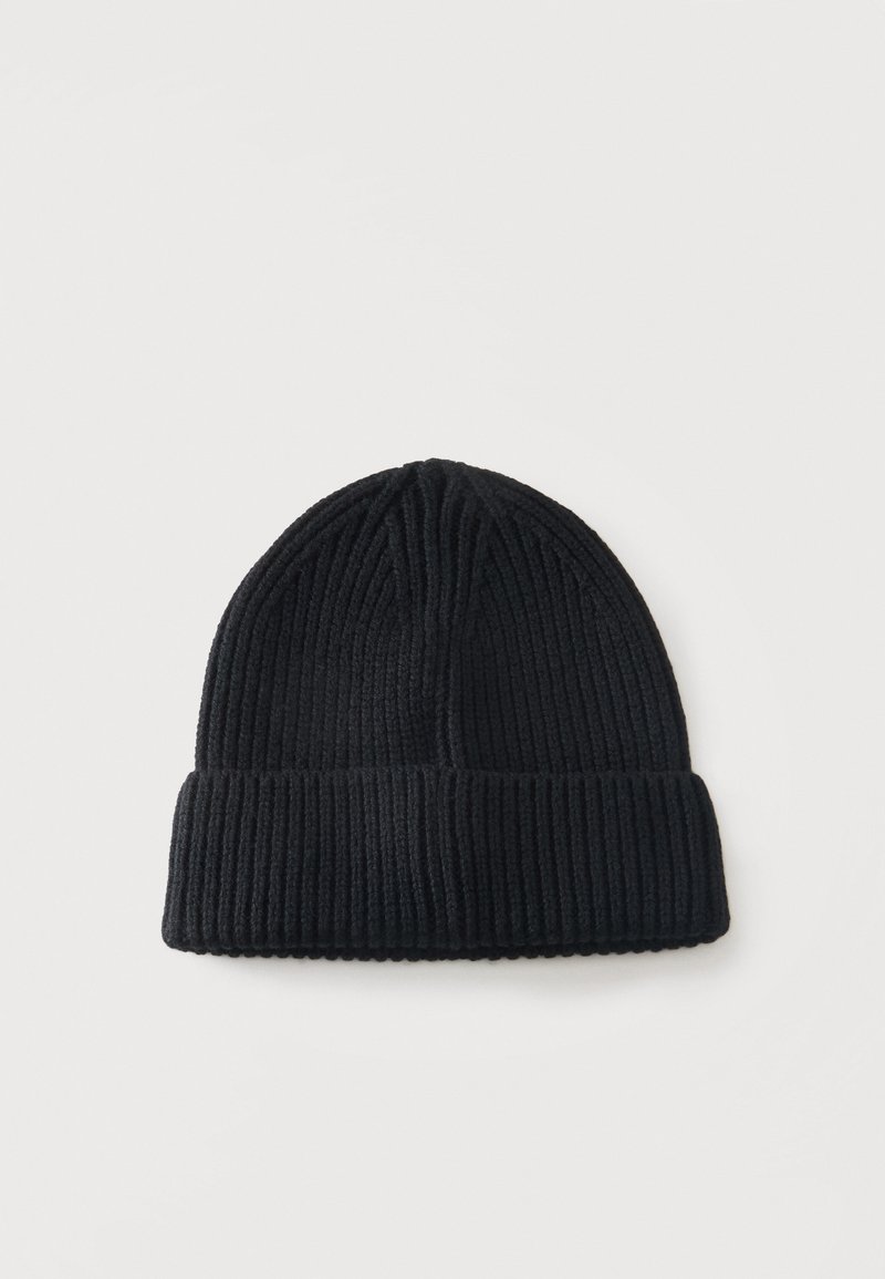 Black ribbed knit beanie hat with folded cuff displayed on a plain white background.