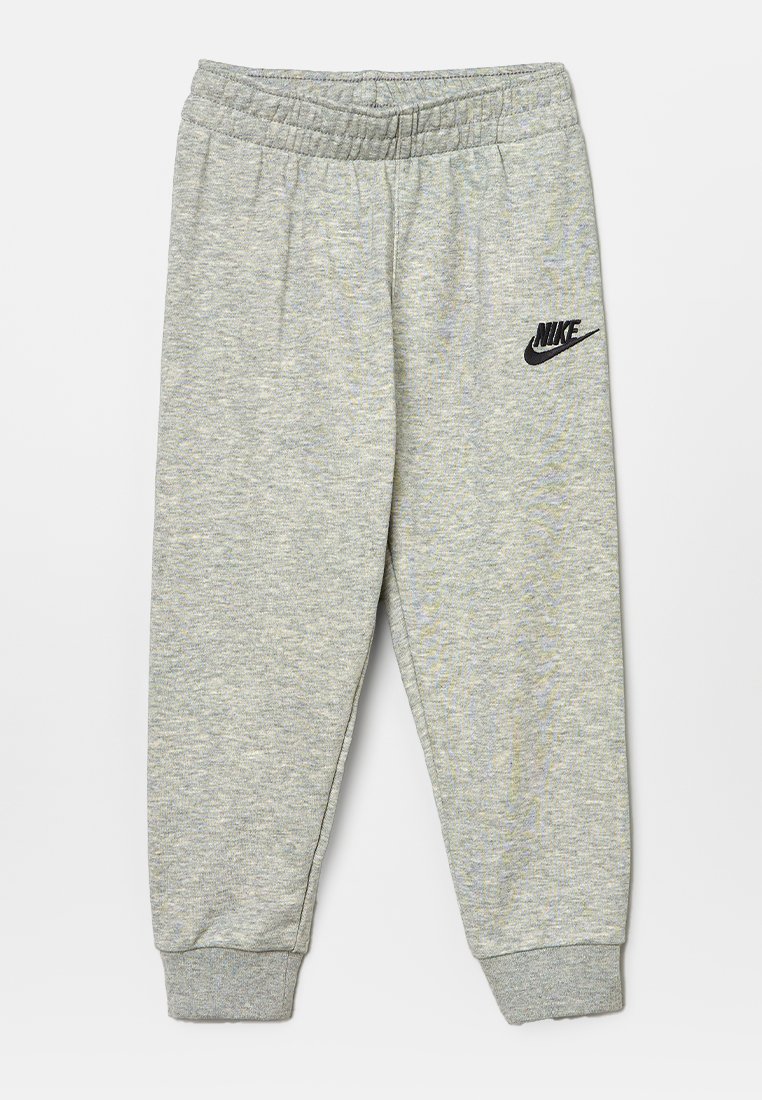 Pantalones de chándal grises hechos de suave tejido de jersey con una cintura elástica, puños ajustados y un logo negro de Nike en la cadera izquierda.