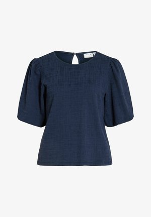 Blouse en tissu texturé bleu marine avec manches courtes bouffantes, encolure ronde et fermeture dos à bouton avec ouverture en forme de goutte.
