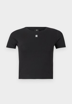 Tricou din bumbac negru, cu design cu mânecă scurtă, are un decolteu rotund și un mic logo alb pe piept. Textură netedă.