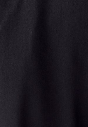 Black fabric showing a slightly textured surface, with a matte finish and subtle weave pattern, indicating a lightweight material.