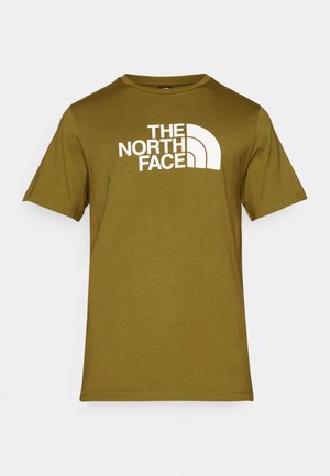 T-shirt in cotone verde oliva con una stampa bianca del logo "THE NORTH FACE" e elementi di design curvi sul davanti. Collo tondo, maniche corte.