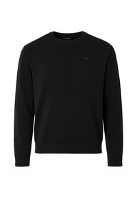 Svart strikket genser med rund hals, ribbestrikkede mansjetter og kant. Har et lite, subtilt logopatch på brystet. Myk tekstur.