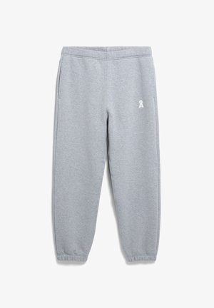 Grijze sweatpants van zacht materiaal, met een elastische tailleband, twee zijzakken en een klein wit logo nabij de linkerzak.