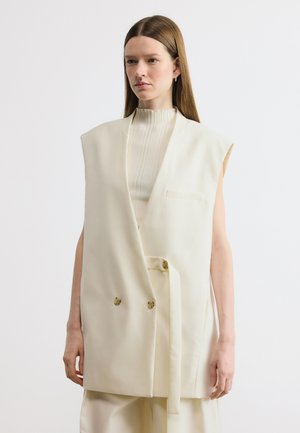 JAWIKIRI - Waistcoat - open white