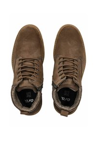 Scarpe marroni in pelle alte, con punta rotonda, chiusura con lacci, dettaglio con zip e fodera morbida. Presentano accenti di cucitura a contrasto.