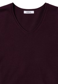 Bordeaux V-hals trui van zacht breiwerk. Heeft een strak design en een label met de merknaam "CECIL."