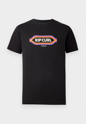 T-shirt in cotone nero con un logo colorato "RIP CURL" in stile retrò e il testo "SINCE 1969" sotto il logo. Maniche corte, collo tondo.