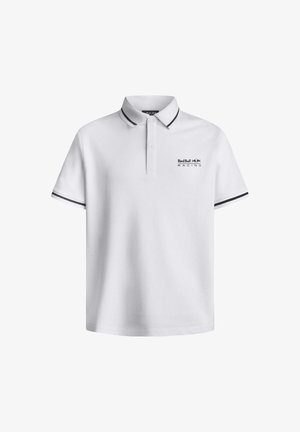 Vit polotröja med klassisk krage, korta ärmar, med svarta detaljer på ärmarna och "Red Bull Racing"-logotypen på bröstet.