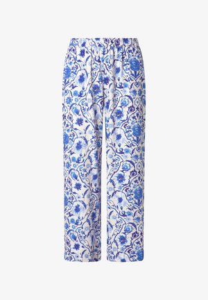 Witte broek met losse pasvorm en blauw bloemmotief, voorzien van een elastische tailleband en rechte pijpen.