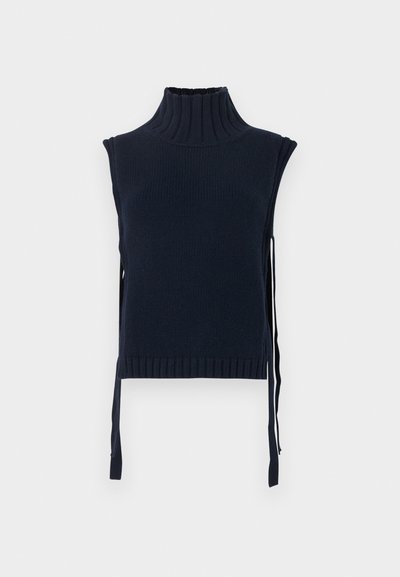 Haut sans manches en maille bleu marine avec un col montant côtelé, des liens latéraux pour ajuster, et une silhouette ajustée. Tissu texturé avec nervures.