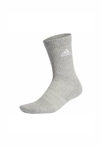 Calcetín de mezcla de algodón gris con textura acanalada y logo blanco de Adidas. De longitud media, con rayas sutiles.