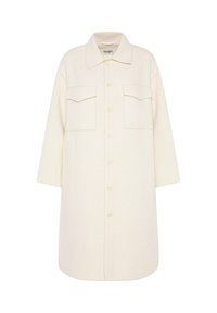 Cremefarbenes Hemdblusenkleid mit Kragen, zwei Fronttaschen und lockerem Schnitt. Hergestellt aus strukturiertem Stoff.