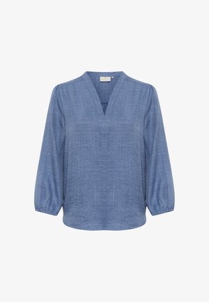 Blouse légère bleu avec de longues manches ballon, décolleté en V et un tissu légèrement texturé. Présente une coupe décontractée et un ourlet arrondi.