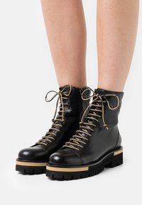 Bruno Premi Botines con plataforma - black