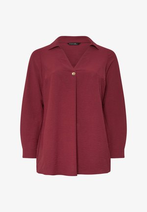 Bordeaux langemouwen blouse met een knoopsluiting, kraag en gestructureerde stof. Heeft een V-hals en een relaxte pasvorm.