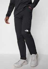 The North Face WINTER EXPLORATION TAPERED CARGO  - Hlače za na prostem - black