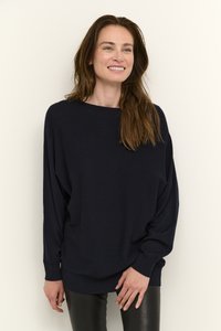 Navy blue oversized sweater with a wide neckline, long sleeves, and ribbed hem, paired with black leather leggings. Plain design, soft texture.