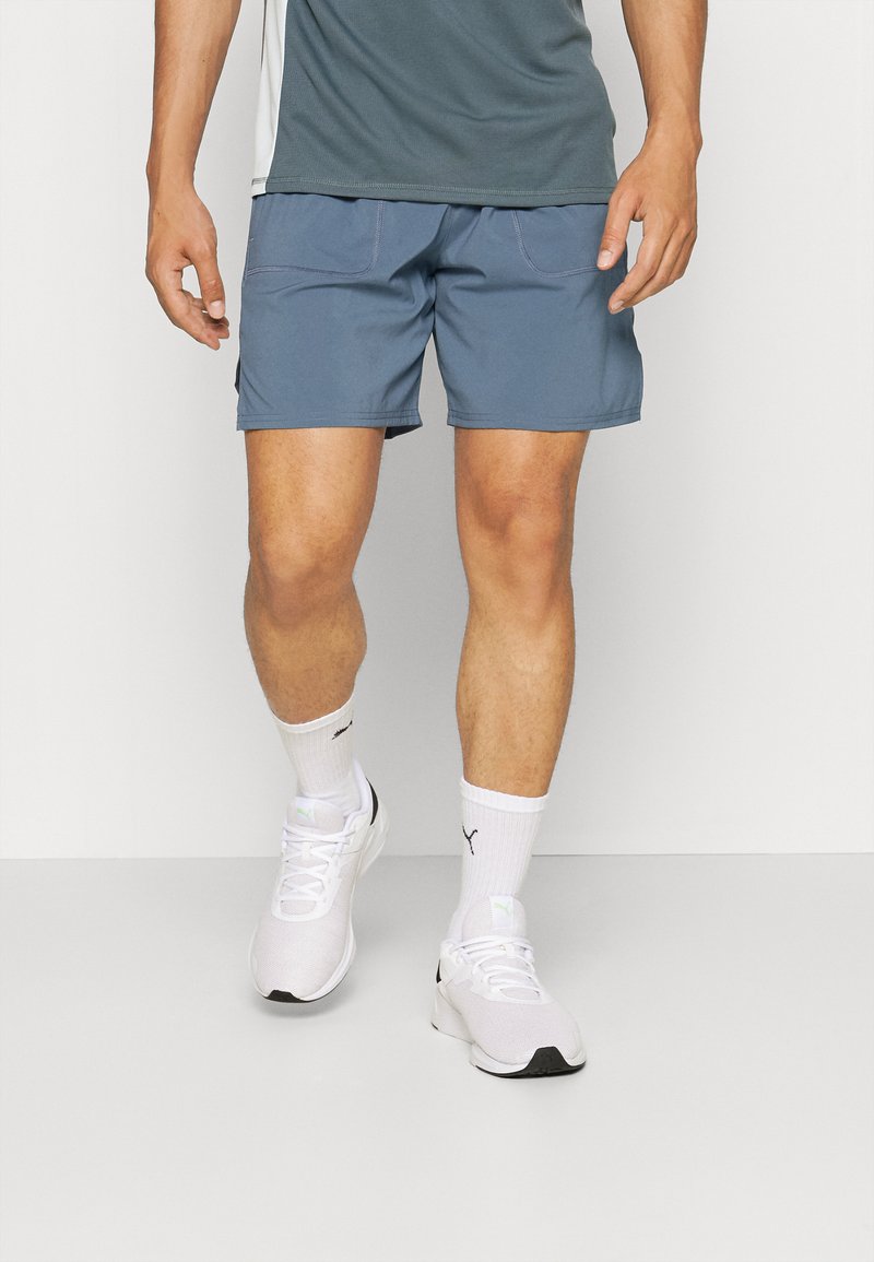 Puma RUN GRAPHIC SHORT Sports shorts evening sky/blue Zalando.co.uk