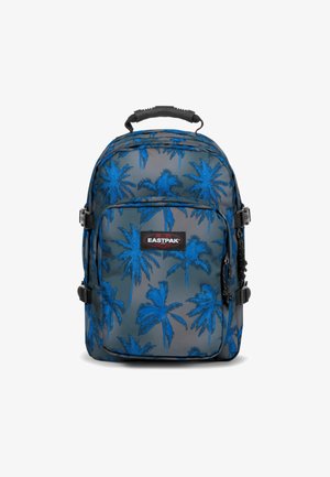 Sininen palmupuun kuvio harmaalla taustalla, pehmustettu reppu säädettävillä hihnoilla, yläkahva ja etupuolen vetoketjullinen tasku, jossa lukee "EASTPAK."