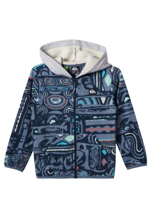 Fleece patterned hoodie in navy with abstract designs in teal, red, and white. Features a grey hood and zip closure, with side pockets.
