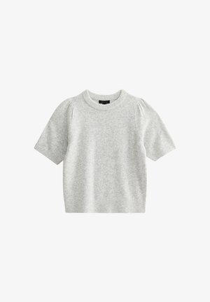 Lichtgrijze korte mouwen trui gemaakt van zachte gebreide stof. Heeft een ronde halslijn en subtiele pofmouwen met een ribgebreide zoom.