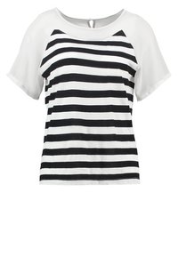 Randig t-shirt med svart och vita horisontella ränder. Mjuk tygkvalitet, rund halsringning, korta ärmar och en lös passform. Nyckelhålsdetalj på baksidan.