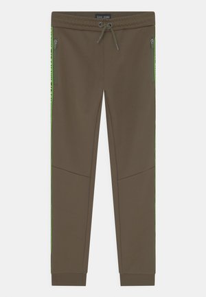 Bruine taps toelopende joggingbroek met elastische tailleband en trekkoord, zijzipzakken, geribbelde boorden en neon groene streepdetails langs de zijkanten.