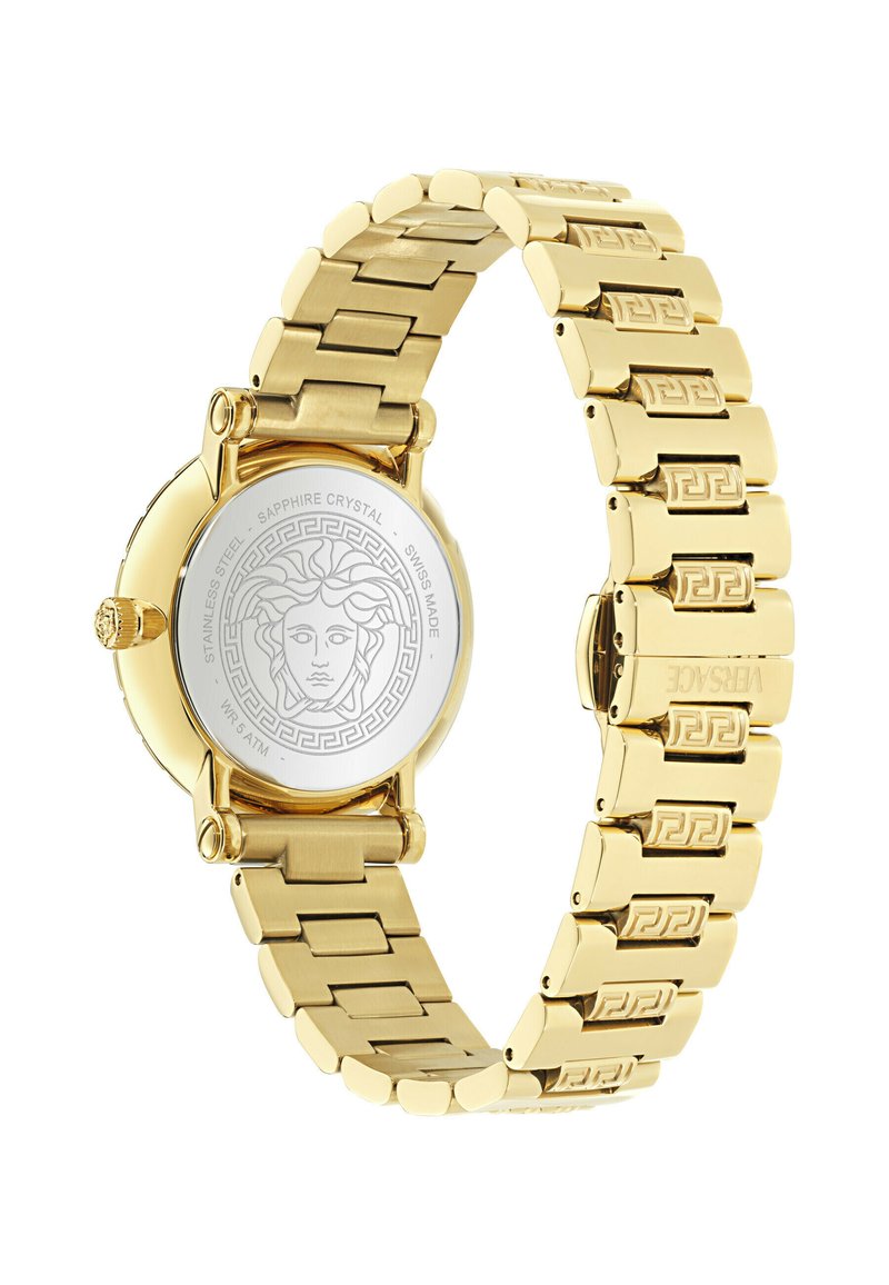 Armbanduhr aus goldfarbenem Metall mit eingraviertem Medusa-Kopf auf der Rückseite, Gliederarmband mit griechischem Schlüsselmuster, Schweizer Herstellung, Edelstahl, Saphirglas.