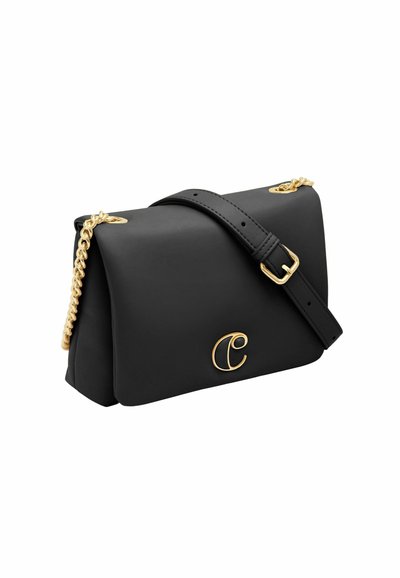 Black leather handbag with a gold chain strap, featuring a smooth texture and a gold emblem of the letter "C" on the front.