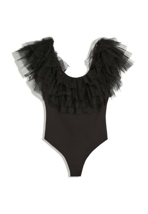 Body noir une pièce avec tulle à volants superposé autour de l'encolure et des épaules, avec un bas ajusté.