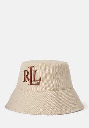 Beige tekstureret bøllehat med brun "RLL" logo broderet foran, sat mod en ensartet lys baggrund.