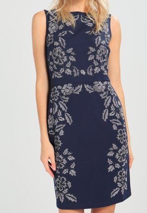 Marineblaue ärmellose Kleid mit floralen Stickereien in Weiß, taillierender Silhouette, knielang, glattes Material und Rundhalsausschnitt.
