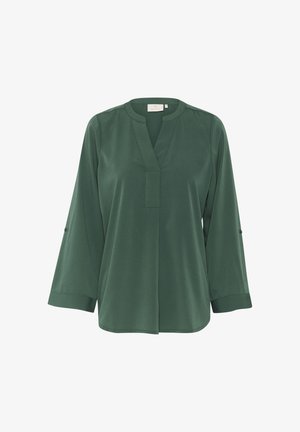 Blusa verde a maniche lunghe con scollo a V e dettaglio con bottoni sulle maniche. Realizzata in un tessuto morbido, ha una vestibilità rilassata e un orlo dritto.